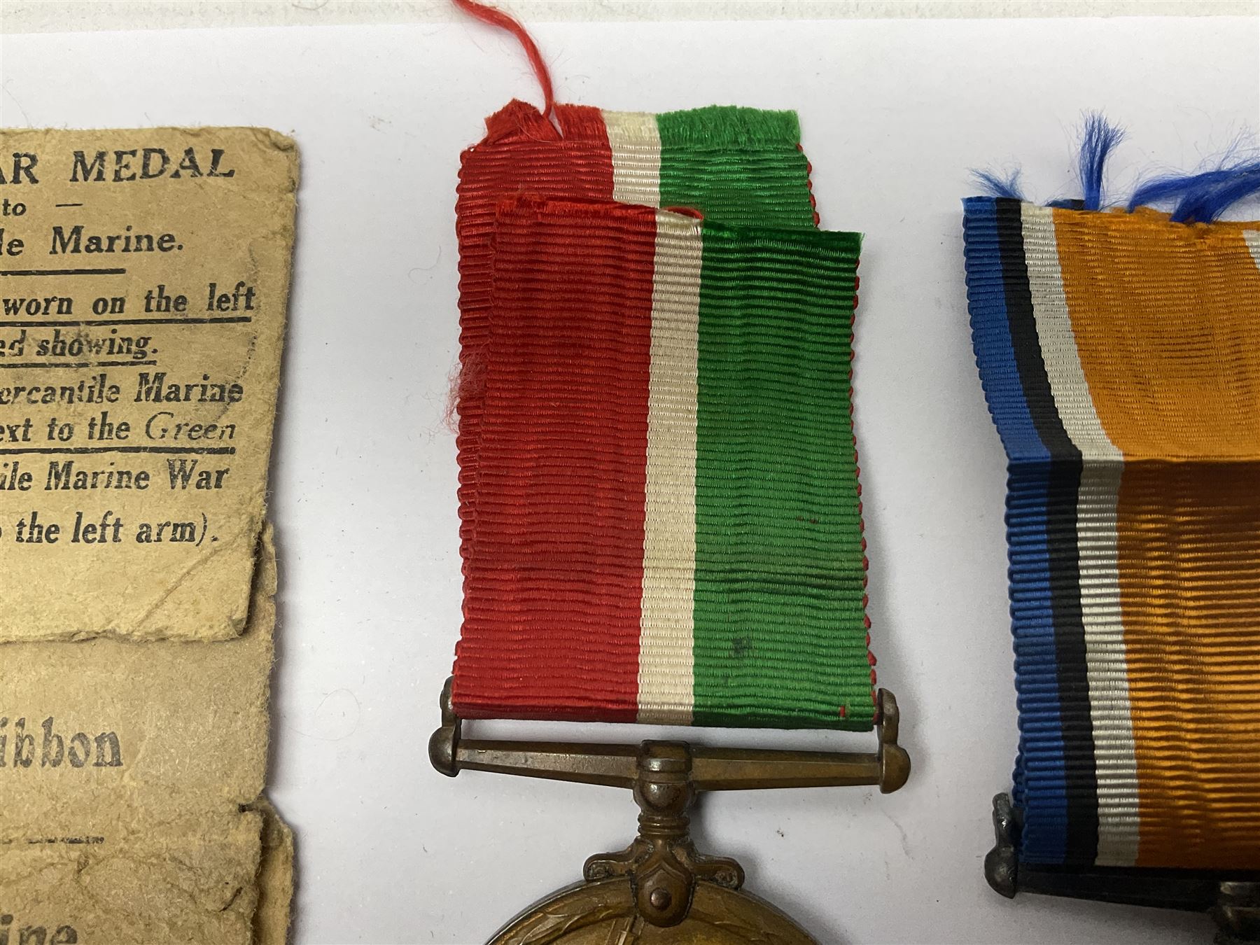 WWI pair of medals comprising Mercantile Marine medal and British War medal, awarded to Dominic L Kelly; both with ribbons and part original packaging and a Victoria Diamond Jubilee medallion.