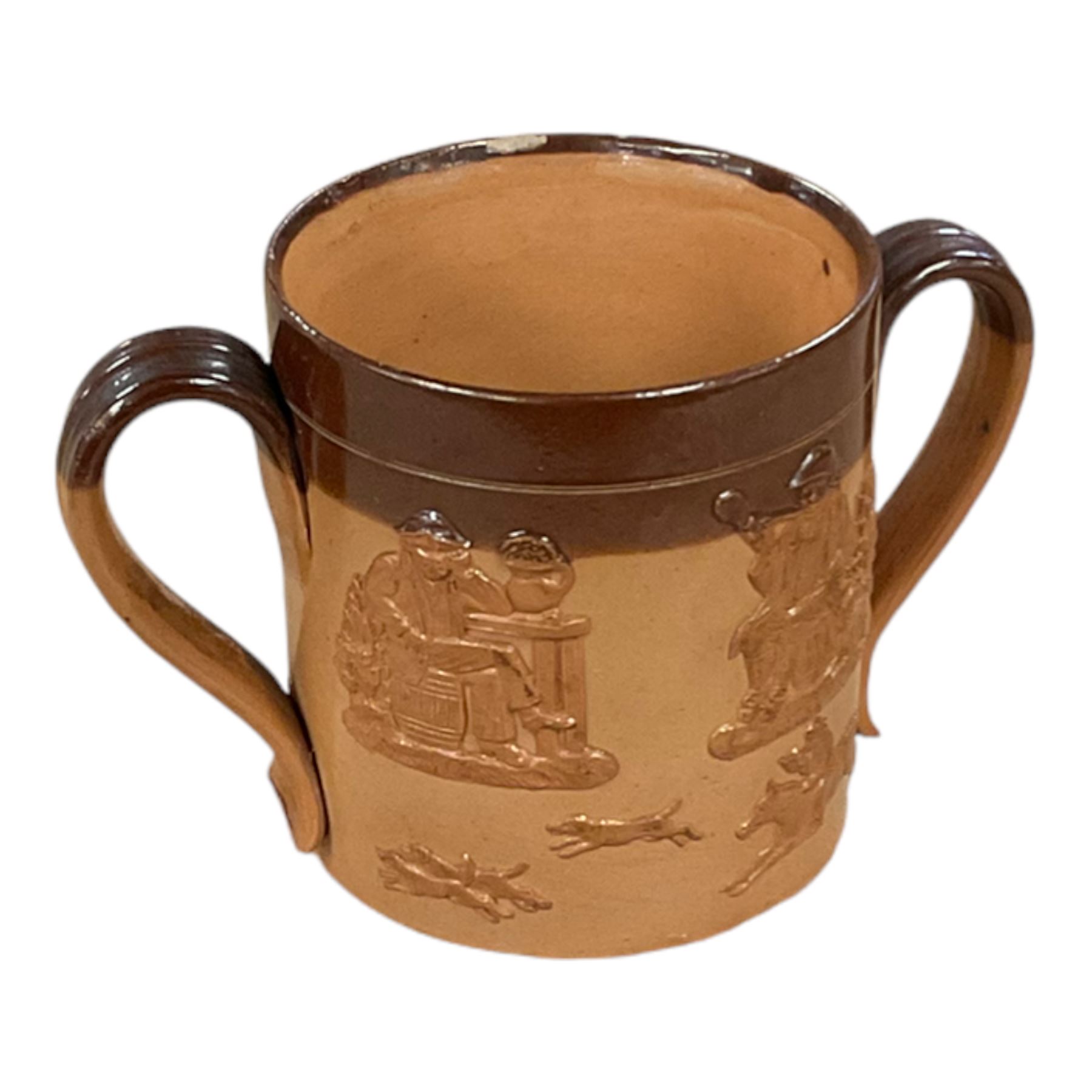 Doulton Lambeth twin handled harvest cup, together with two stone carved figures, glassware etc 