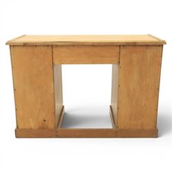 20th century ash twin pedestal desk, gadroon galleried top, twin bank of graduated drawers, plinth base