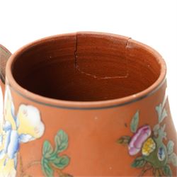 18th century creamware plate, painted with a chinoiserie landscape, D25cm; together with a Wedgwood terracotta jug, stamped to base, H15cm, and a Wedgwood Capri ware coffee pot, stamped to base, H19cm (3)