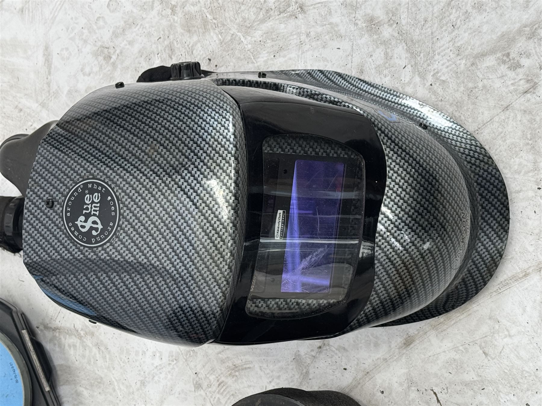 Evolution 110V circular saw and a Kimberley Clark welding mask