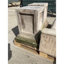 Set of four cast stone architectural columns, tapering form, on square plinth bases
