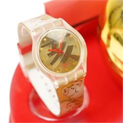 Swatch 2007 Year of the Pig watch set, in presentation box with gilded piggy bank and token