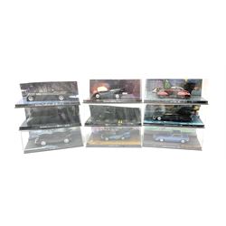 Nine die-cast models of various Batman cars in hard perspex cases; and a quantity of unboxed Bayco construction sections.