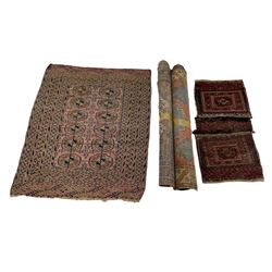 Three early Persian rugs and a saddle rug (4)