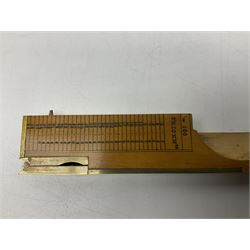 Late 19th/early 20th century boxwood and brass clinometer rule by Stanley, with inset magnetic compass, screw action protractor hinge divided to one degree with rise in inches per yard scale under, spirit level to one edge, marked 'W.F. Stanley Great Turnstile Holborn' with tables of distances, angles and thickness H16cm closed: in original leather covered case with instructions