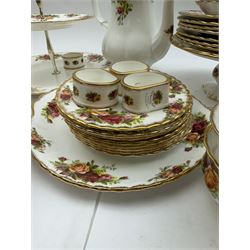 Royal Albert Old Country Roses pattern tea wares, comprising coffee pot, jug and sugar bowl, cake stands, napkin rings, teacups and saucers, side plates, dessert plates, small plates, all with printed marks beneath