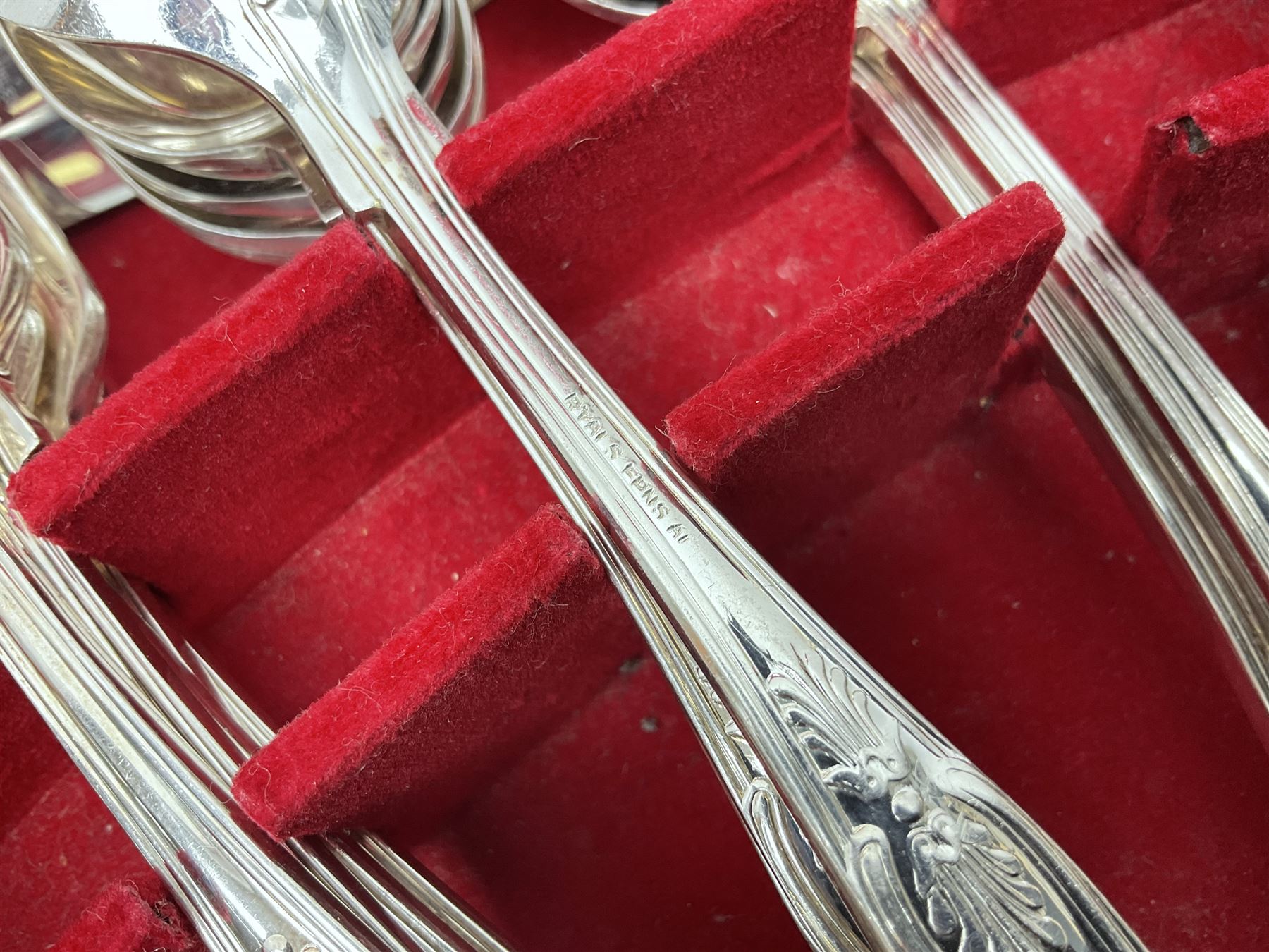 Canteen of King's pattern cutlery for six place settings by James Ryals of Sheffield, with two extra forks, pair of salad servers and six fish knives, all within fitted wooden case, together with six ivorine handled butter knives and six silver plated cake forks