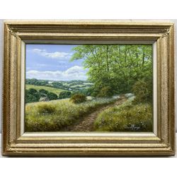 David Morgan (British 1964-): 'Bluebell Path', oil on canvas signed, titled and dated 1999 verso 34cm x 50cm
Provenance: with E Stacy-Marks, Polegate, East Sussex, Stock No.MO888, label verso