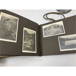 Quantity of post cards in six albums, local interest and photographic postcards, together with an art deco style table lamp