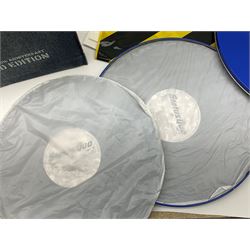 Status Quo: The Official 40th Anniversary Limited Edition book No.926/3000 with certificate signed by Rossi and Parfitt. Duplicate signatures by Rossi and Parfitt on pages within the book. Denim dustjacket; 'From The Makers Of ....' boxed set of three LP records in circular blue tin; and quantity of tour carrier bags