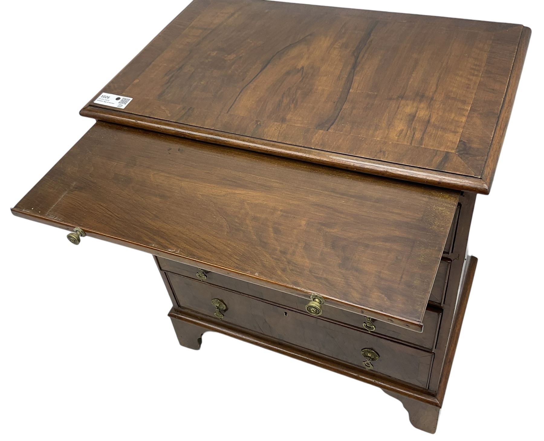 Georgian design walnut chest, crossbanded rectangular ovolo-moulded top, fitted with slide over four long cock-beaded drawers, on bracket feet