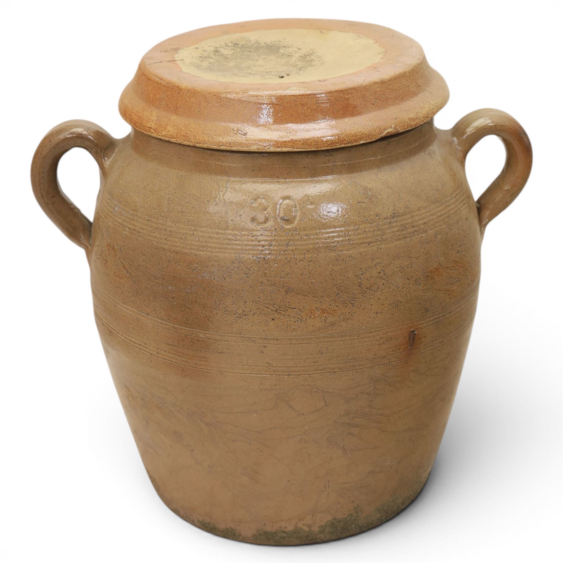 Three large 20th century Spanish stoneware confit pots and covers, each of ovoid form with twin loop handles to shoulders, and lift off covers, tallest example H43.5cm