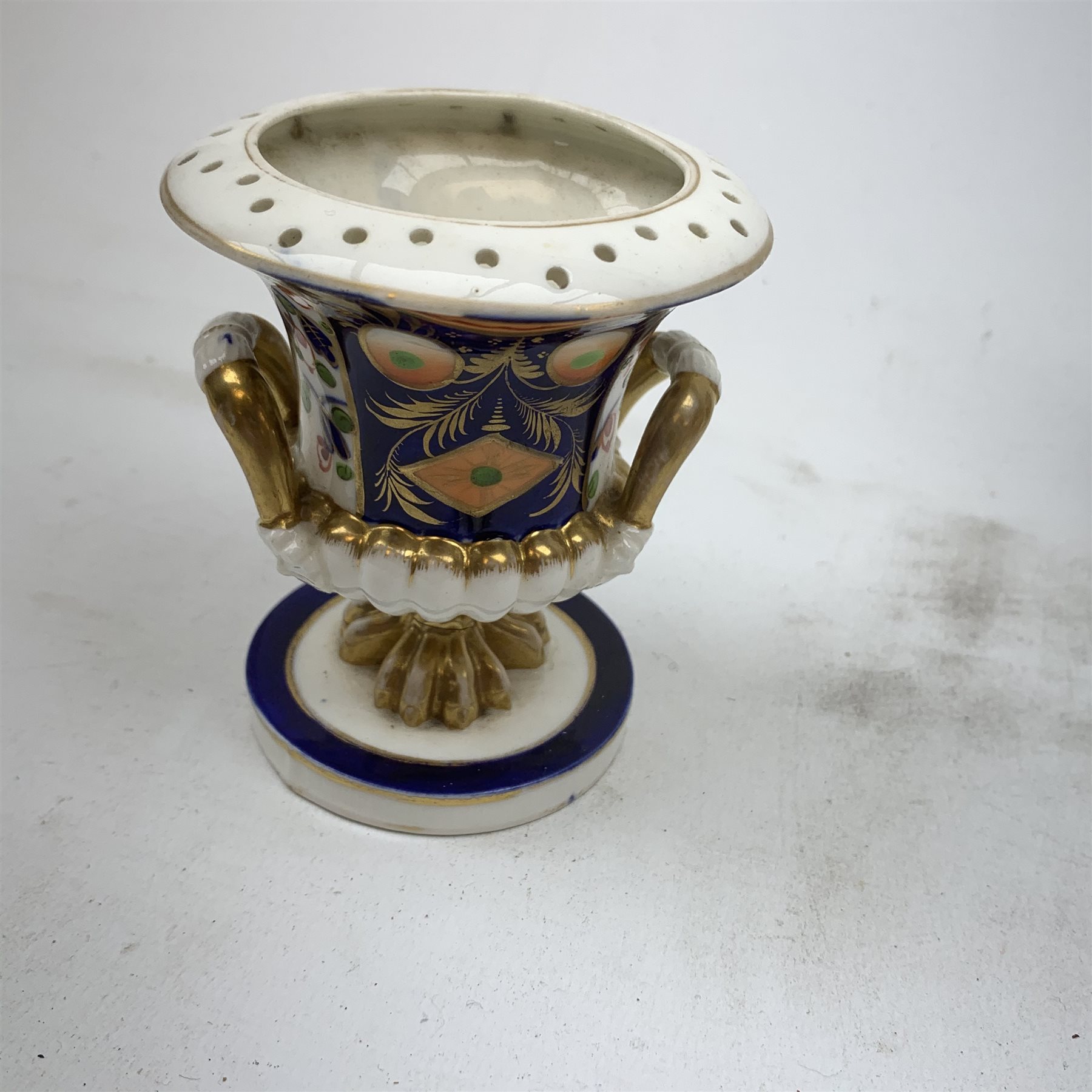 Three Bloor Derby Imari pattern twin handle urms, two examples with covers, each with mark beneath, H12cm, (all a/f), together with a pair of late 19th century Royal Crown Derby Imari pattern urns and covers, each with mark beneath, H13cm, (one significantly a/f). 