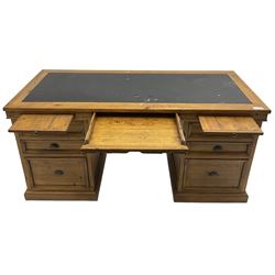 Barker & Stonehouse - pine computer desk, rectangular top over two slides and centre keyboard slide, fitted with six drawers, on moulded plinth base