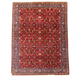 Central Persian Markazi Mahal hand-knotted carpet, terracotta red field, with an all-over ...