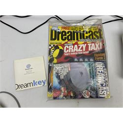 Dreamcast console, one controller, original instruction booklet with magazine and four games, ‘Aerowings’, ‘Buggy Heat’, ‘ Racing Simulation Monaco Grand Prix’ and ‘Who Wants to be a Millionaire’, all in original cases with instruction booklets 