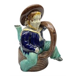 Majolica teapot and cover in the form of an Isle of Man 'Manx Sailor', a three-legged sailor seated on a barrel, H25cm