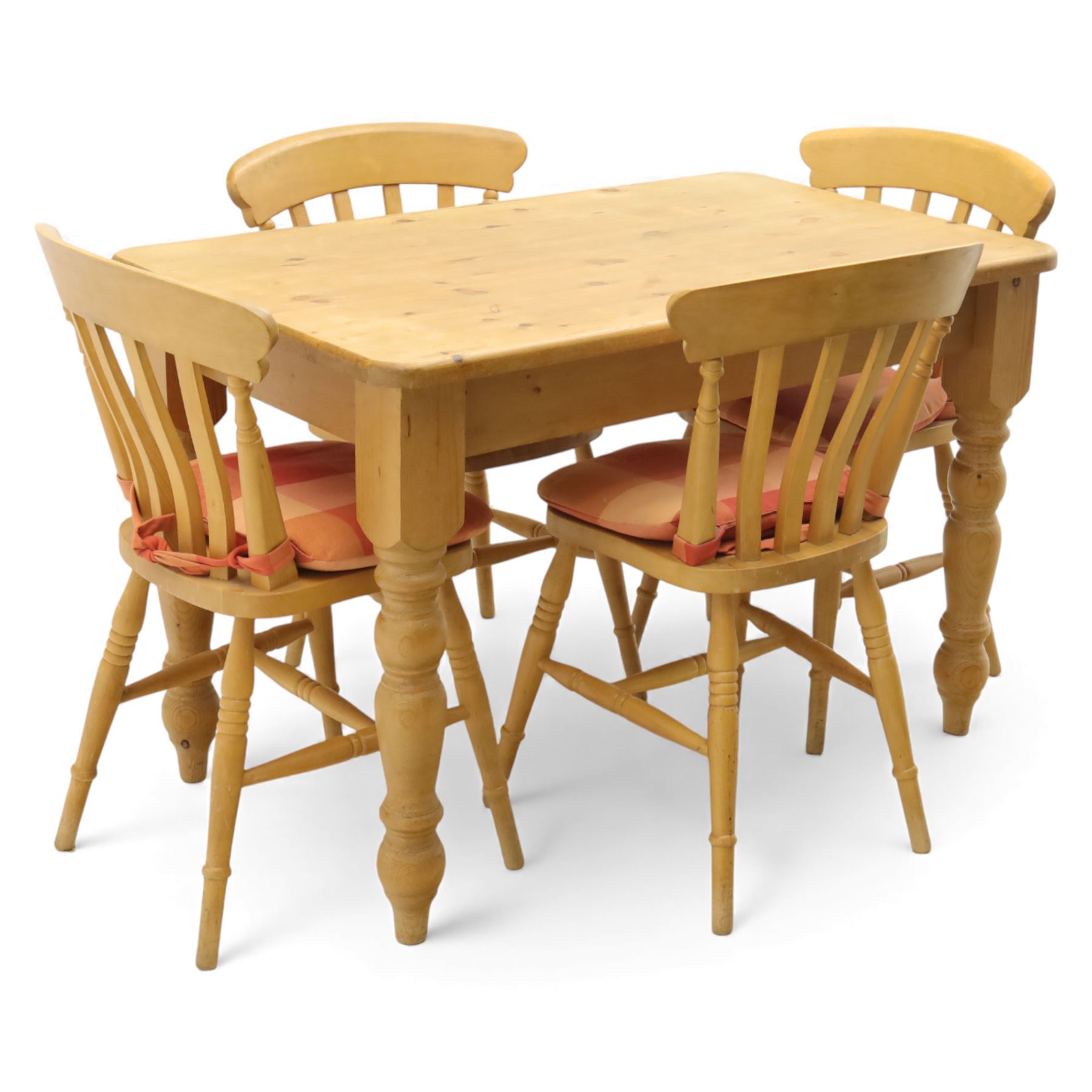 Late 20th century pine farmhouse dining table, rectangular top raised on turned legs, together with a set of matching spindle-back chairs with padded seats