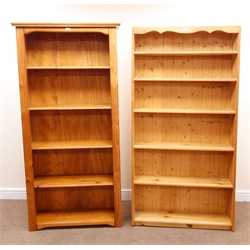  Pine open bookcase, moulded top, four shelves, solid end supports (W89cm, H181cm, D32cm) and another similar bookcase (W90cm, H178cm, D22cm) (2)  