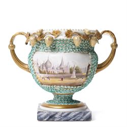 Pair of 19th century Grainger Lee & Co Worcester urns, c1820s-1830s, hand-painted with views of 'Near London Bridge' and 'Brighton Pavilion' upon a ground of encrusted forget-me-not decoration, the beaded rim with twin naturalistically formed handles, leading into vines moulded with strawberries in high relief, the pedestal painted to imitate marble, painted marks to base, H20cm
