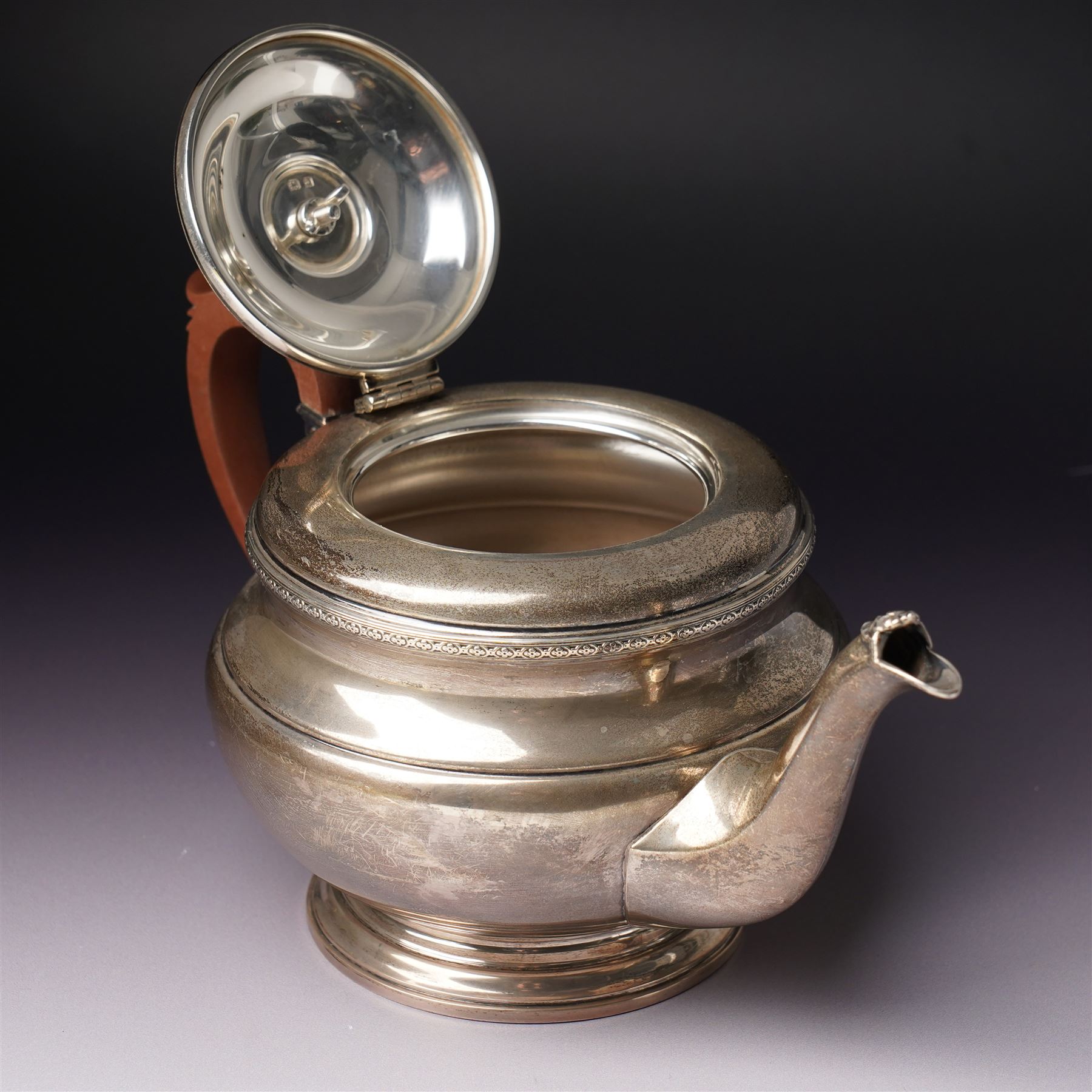 Silver circular teapot with stained wood handle and lift Birmingham 1933 Maker Adie Bros. Ltd