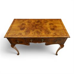 Queen Anne Design walnut kneehole desk with matching chair, rectangular figured top with crossbanding, three frieze drawers, raised on cabriole supports, the chair with serpentine front raised on cabriole supports