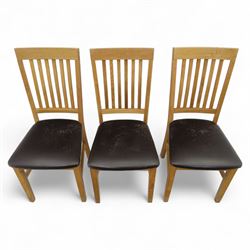 Contemporary set of six light oak dining chairs with faux leather cushion seats 
