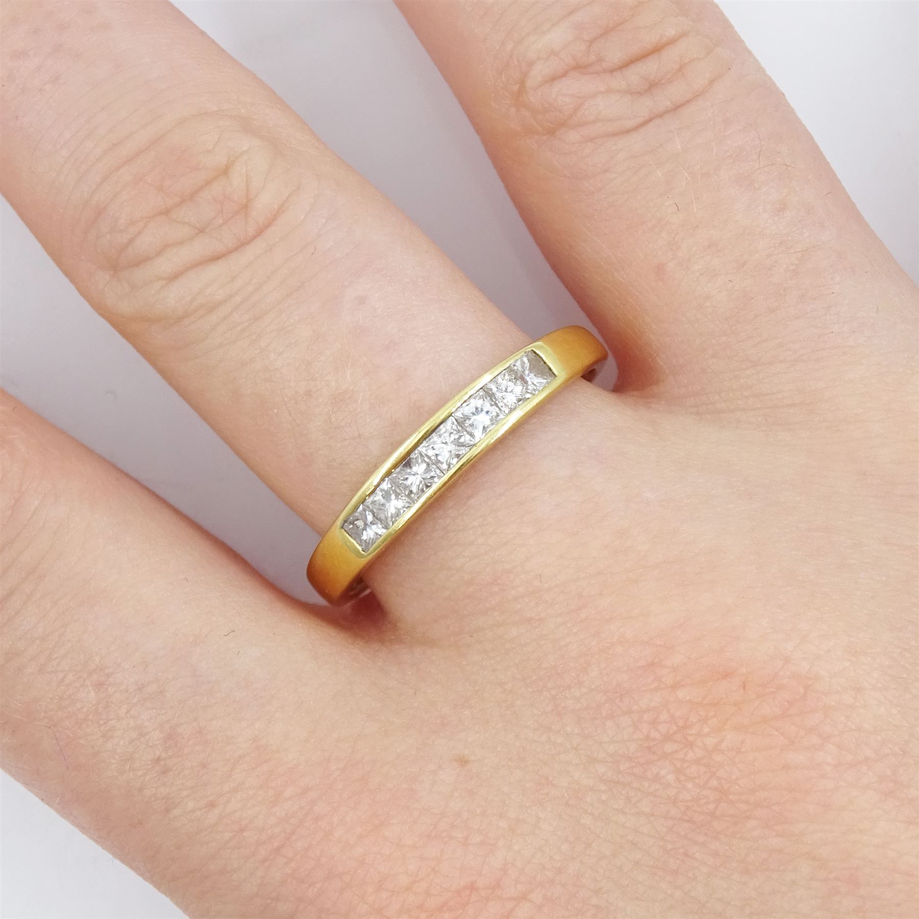 Iliana 18ct gold seven stone princess cut diamond half eternity ring, stamped, total diamond weight 0.50 carat 