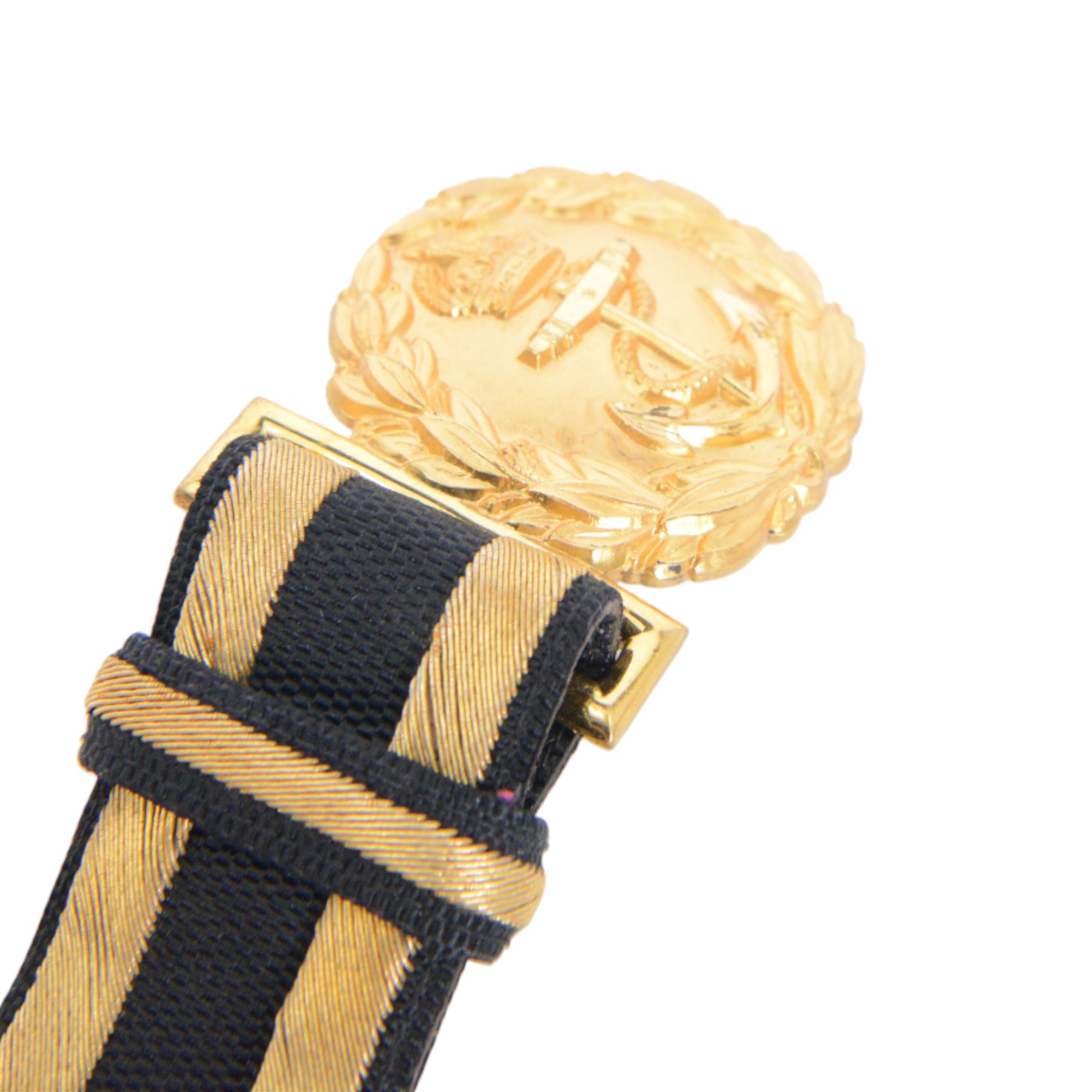 British 1827 pattern Naval officer's sword, named, by Wilkinson Sword Company in 1920 for P.H. Earle and retailed by Gives, the 80cm slightly curved blade etched to both sides, the brass guard held into scabbard by patent spring clip, lion head pommel and backstrap, with sword knot, within leather scabbard with three brass mounts, twin suspension rings and attached belt and suspension straps with gilt buckle and braid, overall L98cm 