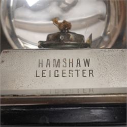 Hamshaw (Leicester) - pair of Edwardian white metal and toleware carriage lamps, the pagoda moulded with patera motif, over a rectangular body with oval convex lens and bevelled glass and reflective panels, cylindrical stem, maker engraved to candle mount
