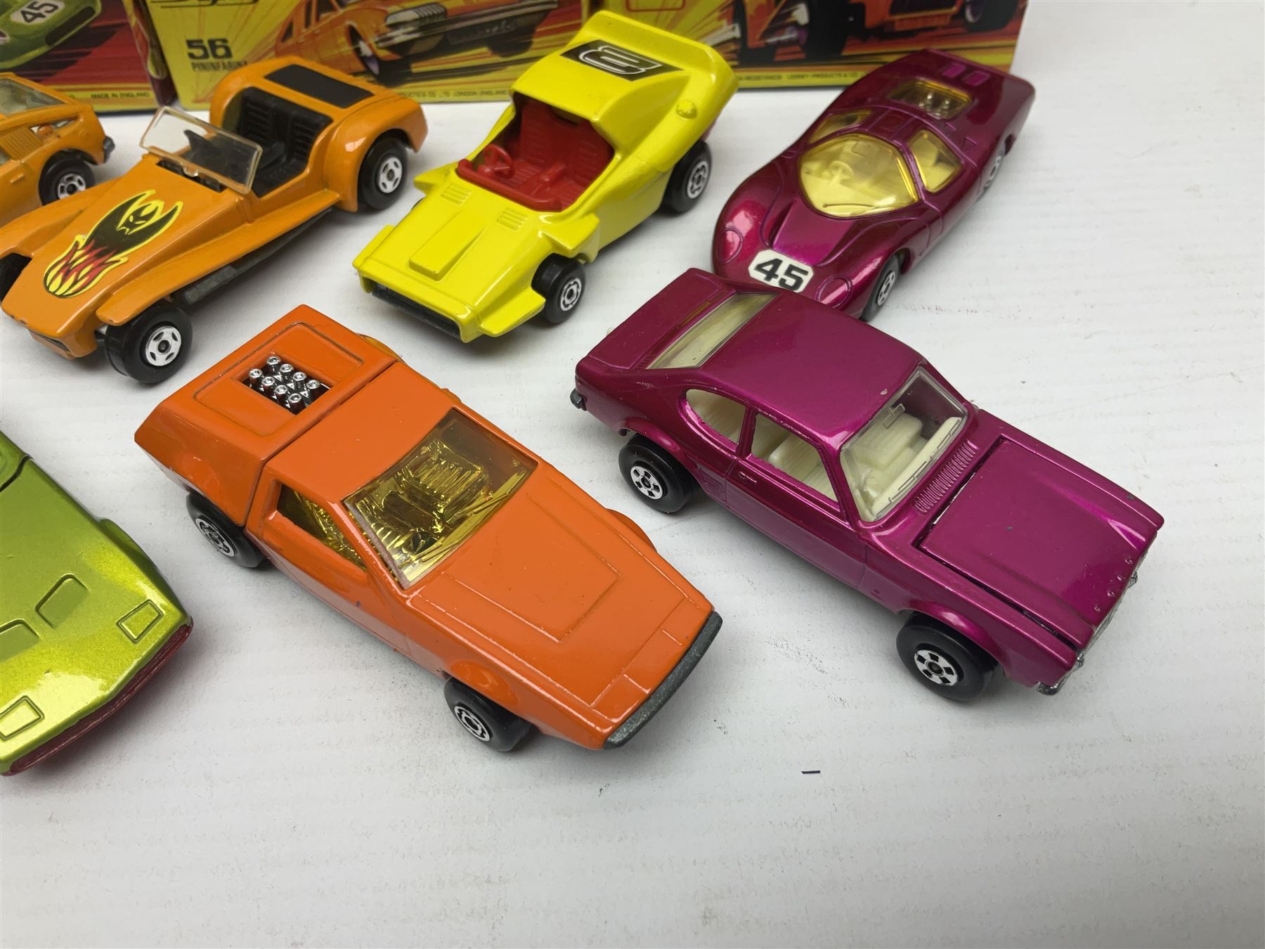 Matchbox 1-75 Series 'Superfast' ex-shop stock - eight models comprising 45c Ford Group 6, 52c Dodge Charge Mk.III, 53d Tanzara, 54c Ford Capri, 56c Pinifarina, 58d Woosh 'n' Push, 60c Lotus Super Seven and 62d Dragster; all boxed (8)