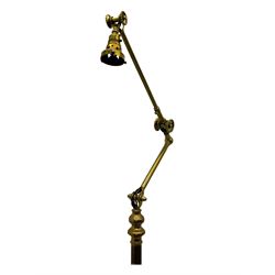 Early 20th century brass adjustable floor lamp, Royal Doulton decorative ceramic base embellished with raised floral and scroll patterns, stamped, brass column and adjustable arms terminating in brass bulb holder