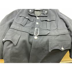 LNER Police cape; indistinctly dated 1943(?); York & North East Yorkshire Police belted tunic; belted tunic with Chief Constable epaulettes and buttons; and another tunic with staybrite Queens Crown buttons (4)