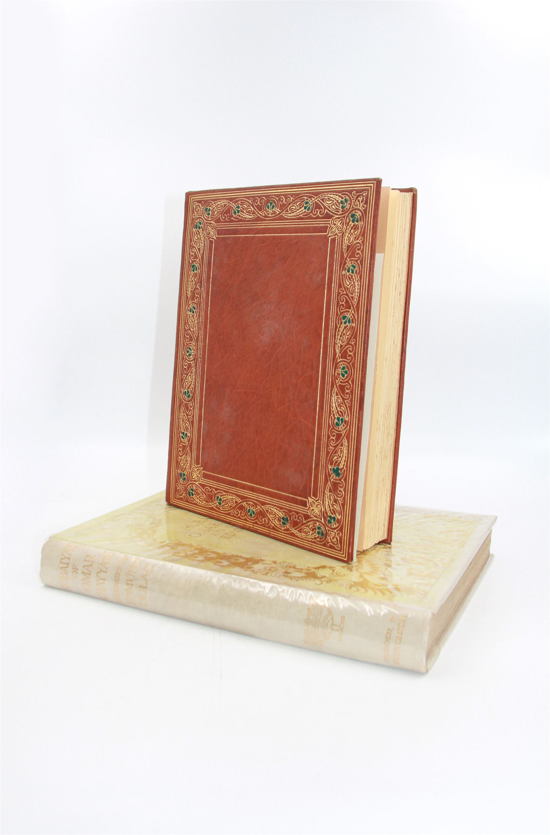 Rubaiyat of Omar Khayyam - two editions
Two editions of Fitzgerald, Edward (Translator) - 'Rubaiyat of Omar Khayyam', one with gilt leather coverer illustrated by Willy Pognay, the second illustrated by Edmund Dulac