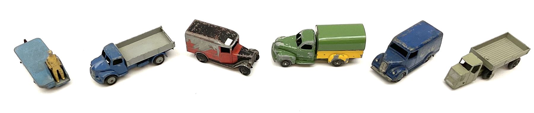 Dinky - six unboxed and playworn early die-cast commercial vehicles including French made Studebaker M16 covered wagon, Trojan Oxo van, B.E.V. Truck, Dodge Tipper, Royal Mail Van etc (6)