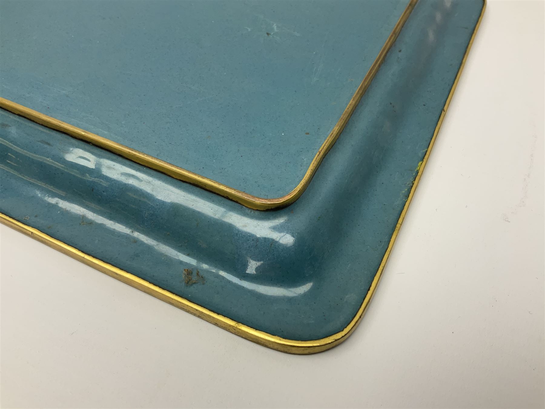 20th century Chinese cloisonne enamel smoking set, comprising two ashtrays, box and tray, with floral and foliate scrolling on green ground