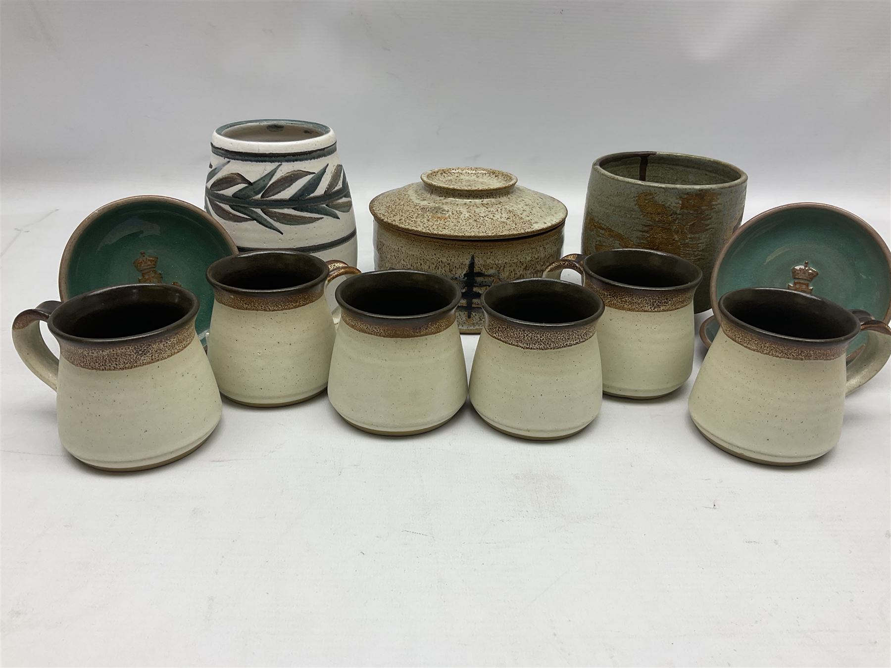 Collection of studio pottery, to include salt glaze vase with trailed decoration, impressed JH mark, possibly Joanna Still (nee Harrisson), set of six cups and vase by Diana Eden with impressed DE marks beneath, etc