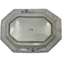 Two 18th century Chinese export octagonal platters, decorated with scenes of peonies and other flowers in a fenced garden, L50cm