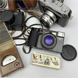 Collection of cameras to include: Polaroid 600 Land Camera SLR 680 with auto focus/auto strobe, Rollei XF 35, Canon ML AF35, Fuji TW-300, Balda Baldina Compur-Rapid, YASHICA LYNX-5000, Canon Canonet QL19, flash bar and two light meters in one box