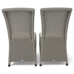Neptune – Sheldrake limed oak extendable dining table and eight Havan loom chairs, the oval top in limed oak finish with four additional leaves extending the table to seat up to ten (Extends to cm), raised on turned legs with two additional centre supports, the matching Havan loom chairs finished in grey with cream upholstered seat covers (H 95cm, W 47cm, D 55cm)