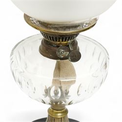 Victorian brass column table oil lamp with pink glass reservoir and etched shade H61cm and a smaller lamp with opaque shade