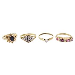 Four 9ct gold rings including single stone diamond, ruby and diamond half eternity, sapphire and diamond cluster and diamond cluster