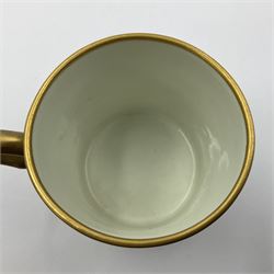 Sèvres soft paste porcelain coffee can and saucer with date code for 1767, painted with floral and laurel leaf garlands within blue scalloped and gilt borders, interlaced LL monogram enclosing the date letter O above painters mark for Catrice, coffee can H7.5cm, saucer D15cm
