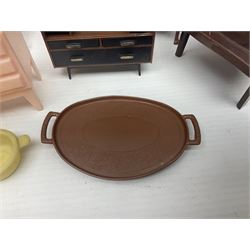 Seven Pippa dolls and a collection of plastic dolls house furniture