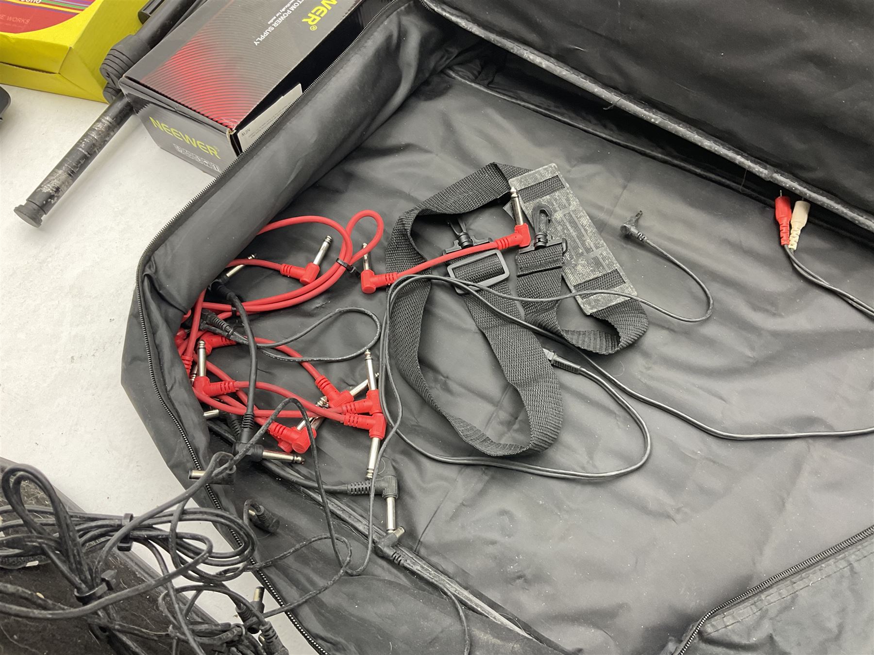 Alesis SR-16 drum machine, Neewer 48V phantom power supply, microphone stand, Genexxa microphone, quantity of jack to jack cables and other similar items