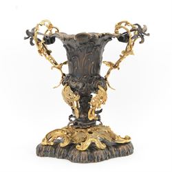 After Henry Dasson (1825-1896): large French gilt bronze urn, the body of typical form and cast with C scrolls, with twin curved gilt foliate handles detailed with birds, upon a scrolling foot, and naturalistically cast base, impressed HENRY DASSON to foot, H50.5cm W48cm