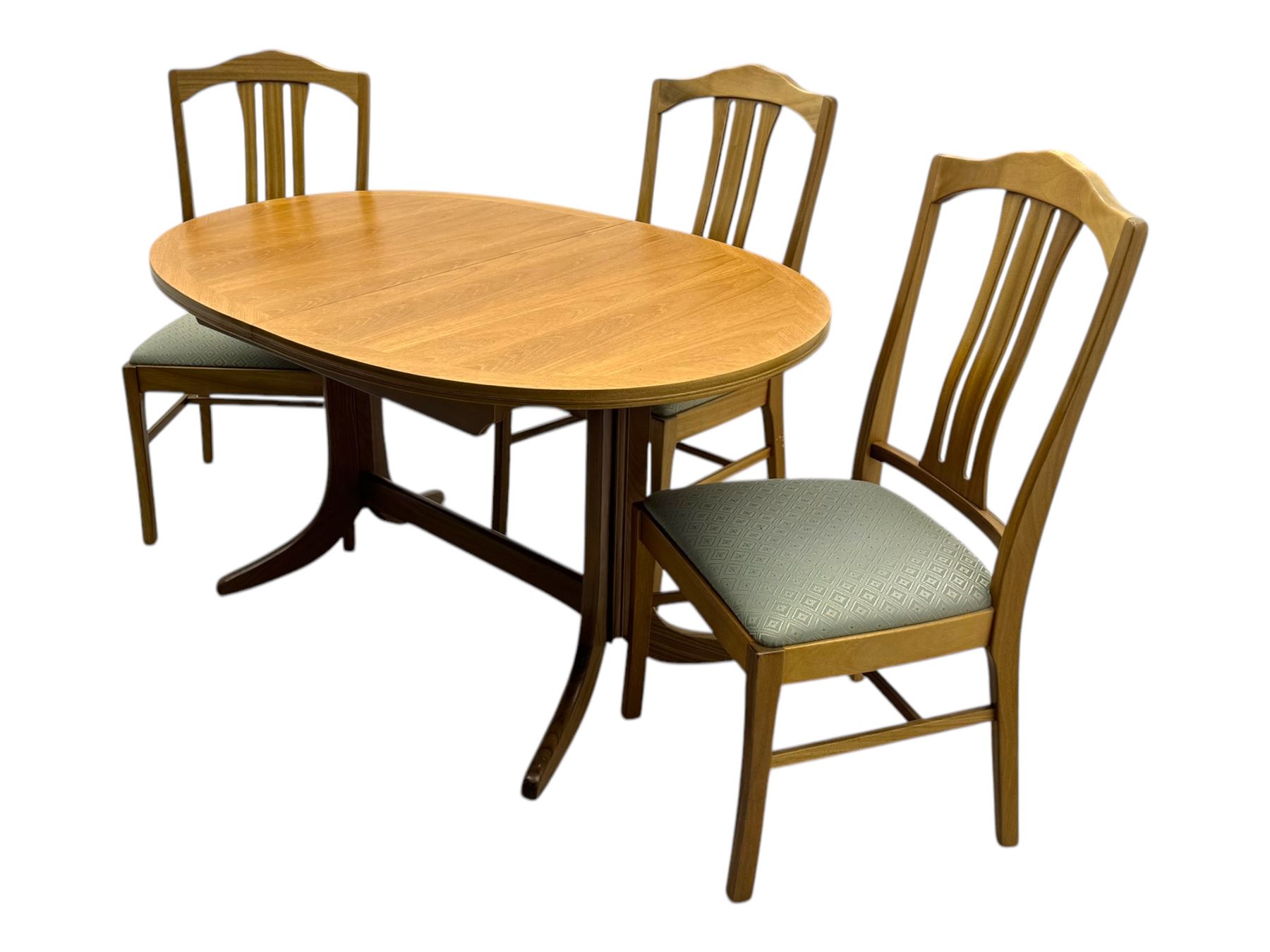 G-Plan - mid-20th century teak extending dining table, oval top with concealed central butterfly leaf extension, raised on splayed supports with cross-stretcher; three dining chairs with curved top rail and vertical splats