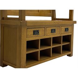 Light oak hall bench, tripled panelled back, fitted with drawers and shoe holes