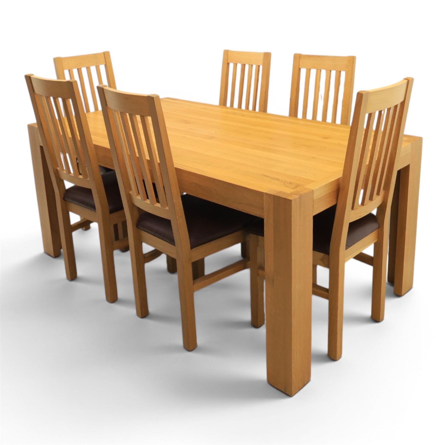 Modern solid oak dining table with set six chairs, chairs with brown leatherette seat